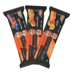 Three Ultra Jelly 2:1 energy bars in black and orange packaging, with flavors strawberry-blueberry, apricot-peach, and orange.